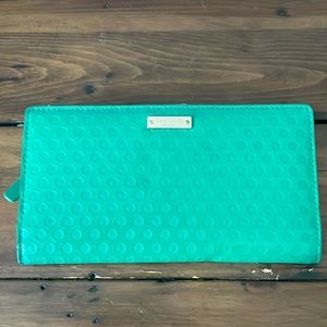 Kate Spade Green wallet with 13 spots for cards, picture for small purse